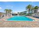 Resort-style pool with plenty of lounge chairs and shade, and easy beach access at 1255 E Peppertree Dr # 507, Sarasota, FL 34242