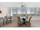 Charming sun room with floor to ceiling windows offering a panoramic view at 1255 E Peppertree Dr # 507, Sarasota, FL 34242