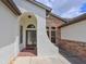 Charming home with an arched front entrance and stone accents at 12644 20Th E St, Parrish, FL 34219
