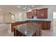 Well-equipped kitchen featuring stainless appliances, abundant cabinetry, and a practical center island at 12644 20Th E St, Parrish, FL 34219