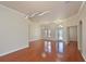 Bright living room featuring hardwood floors, crown molding, and elegant lighting fixtures at 12644 20Th E St, Parrish, FL 34219