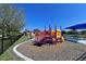 Colorful playground equipment with slides, ladders, and climbing structures offers outdoor fun for children at 12644 20Th E St, Parrish, FL 34219