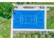 Aerial view of community basketball court with landscaping and sidewalk seating at 12755 Rainwashed Loop, Parrish, FL 34219