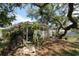 The home's rear exterior features a porch at 129 Pierson Ln, Sarasota, FL 34242