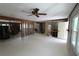 An open-concept living room awaits remodel at 129 Pierson Ln, Sarasota, FL 34242