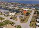 Stunning aerial view of the waterfront community, highlighting the canals, homes, and serene coastal lifestyle at 135 Gulfview Rd, Punta Gorda, FL 33950