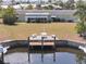 Canal-front home with boat dock, large backyard, and mature landscaping at 135 Gulfview Rd, Punta Gorda, FL 33950