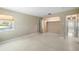 Neutral bedroom featuring closet, window, and entry to another room at 135 Gulfview Rd, Punta Gorda, FL 33950