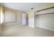Bright bedroom features neutral walls, closet and window with blinds at 135 Gulfview Rd, Punta Gorda, FL 33950
