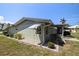Charming single-story home featuring a well-kept yard and tasteful exterior design at 135 Gulfview Rd, Punta Gorda, FL 33950