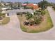 Charming one-story home featuring an attached two-car garage, and lush tropical landscaping on a corner lot at 135 Gulfview Rd, Punta Gorda, FL 33950