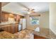 Traditional kitchen with wooden cabinets, granite countertops, and stainless steel appliances at 135 Gulfview Rd, Punta Gorda, FL 33950