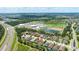 Aerial shot pinpointing a home in a community near ponds and shopping centers at 13819 American Prairie Pl, Bradenton, FL 34211