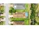 Aerial view of a home with a private pool in a well-maintained community at 13819 American Prairie Pl, Bradenton, FL 34211