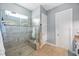 Modern bathroom features a glass-enclosed shower with tile surround at 13819 American Prairie Pl, Bradenton, FL 34211