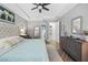 Cozy main bedroom boasts an ensuite bathroom and large walk-in closet at 13819 American Prairie Pl, Bradenton, FL 34211