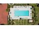Aerial view of the resort-style community pool, perfect for recreation and relaxation at 13819 American Prairie Pl, Bradenton, FL 34211