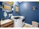 Well-equipped laundry room with modern washer and dryer, ample storage, and convenient sink at 13819 American Prairie Pl, Bradenton, FL 34211
