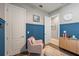 Charming office space with stylish decor, comfortable seating, and convenient access to adjacent rooms at 13819 American Prairie Pl, Bradenton, FL 34211