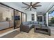 Screened lanai featuring modern furniture with views to the home's interior at 16 Leeward Dr, Placida, FL 33946