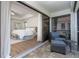 Beautiful main bedroom with hardwood floors leading to a private outdoor patio at 16 Leeward Dr, Placida, FL 33946