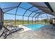 Pool featuring lounge chairs and a view of the golf course at 16 Leeward Dr, Placida, FL 33946