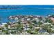 Aerial view of a waterfront community with lush landscaping and stunning bay views at 1610 S Orange Ave, Sarasota, FL 34239