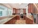 Well-appointed kitchen with stainless steel appliances and granite countertops at 1610 S Orange Ave, Sarasota, FL 34239