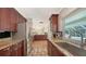 Beautiful kitchen featuring stainless steel appliances and outdoor views at 1610 S Orange Ave, Sarasota, FL 34239
