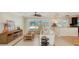 Cozy living room with views of the outdoor pool and comfortable furnishings at 1610 S Orange Ave, Sarasota, FL 34239