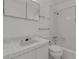 Clean, classic bathroom featuring tiled walls, a vanity with a sink, and a shower-tub combo at 1677 Hyde Park St, Sarasota, FL 34239