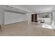 Spacious living area with clean, modern design, polished concrete floors, and minimalist decor at 1677 Hyde Park St, Sarasota, FL 34239