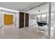 Open living room with natural light, streamlined furniture, and design details that blend seamlessly into a modern space at 1677 Hyde Park St, Sarasota, FL 34239