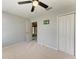 Bedroom with closet and ceiling fan at 1721 Palm Warbler Ln, Ruskin, FL 33570