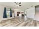 Open floor plan showcases the kitchen and living room with lots of natural light at 1721 Palm Warbler Ln, Ruskin, FL 33570