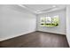 Bright bedroom features recessed lighting, a large window and wood-look flooring at 17723 Palmiste Dr, Bradenton, FL 34202