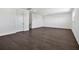 Bonus room features hardwood floors, a door, and a window at 17723 Palmiste Dr, Bradenton, FL 34202