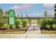 Well-maintained dog park with separate areas for small and large dogs, equipped with amenities at 17723 Palmiste Dr, Bradenton, FL 34202