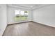 Bedroom with a view of the lake at 17911 Palmiste Dr, Bradenton, FL 34202