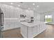 Bright kitchen boasts a center island and ample cabinet space at 17911 Palmiste Dr, Bradenton, FL 34202