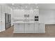 Spacious kitchen with stainless steel appliances and island at 17911 Palmiste Dr, Bradenton, FL 34202