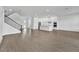 Bright living area with wood floors leading to an open kitchen area at 17911 Palmiste Dr, Bradenton, FL 34202