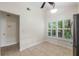 Eat in kitchen area with tile floors and natural light with large window at 1869 Springbush Ln, Clearwater, FL 33763