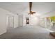 View of the open living room area featuring a brick fireplace and vaulted ceiling at 1869 Springbush Ln, Clearwater, FL 33763