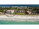 Condo complex aerial view, highlighting its proximity to the beach and pool at 2045 Gulf Of Mexico Dr # M1-514, Longboat Key, FL 34228