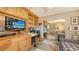 Bedroom features a built-in wall unit and mirrored closet doors, with space-saving daybed and natural light at 2045 Gulf Of Mexico Dr # M1-514, Longboat Key, FL 34228