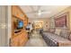 Comfortable bedroom features a built-in wall unit and mirrored closet doors, with space-saving daybed at 2045 Gulf Of Mexico Dr # M1-514, Longboat Key, FL 34228