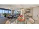 Spacious living room offering a blend of comfort and ocean views at 2045 Gulf Of Mexico Dr # M1-514, Longboat Key, FL 34228