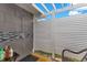 Outdoor shower featuring grey tile at 212 66Th Avenue W Dr, Bradenton, FL 34207