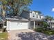 Spacious home featuring an attached two-car garage and a covered front porch at 2306 63Rd W St # 40, Bradenton, FL 34209
